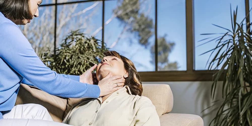 A woman feeling relief and restored energy in a warm counselling session in Edmonton