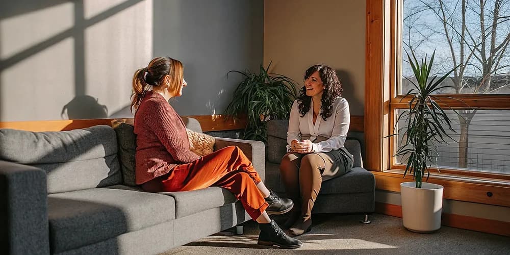 A psychologist offering compassionate depression counselling in Edmonton during a first session